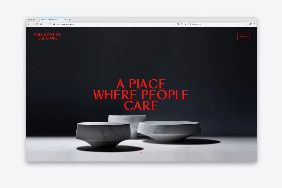 Website featuring a dark background with the words 'A Place Where People Care' in red and three low circular tables displayed.