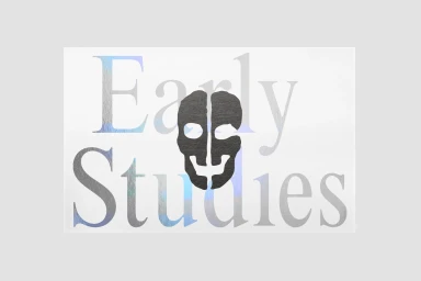 Early Studies brand identity graphic featuring a dark skull icon centered over light grey typography against a white background
