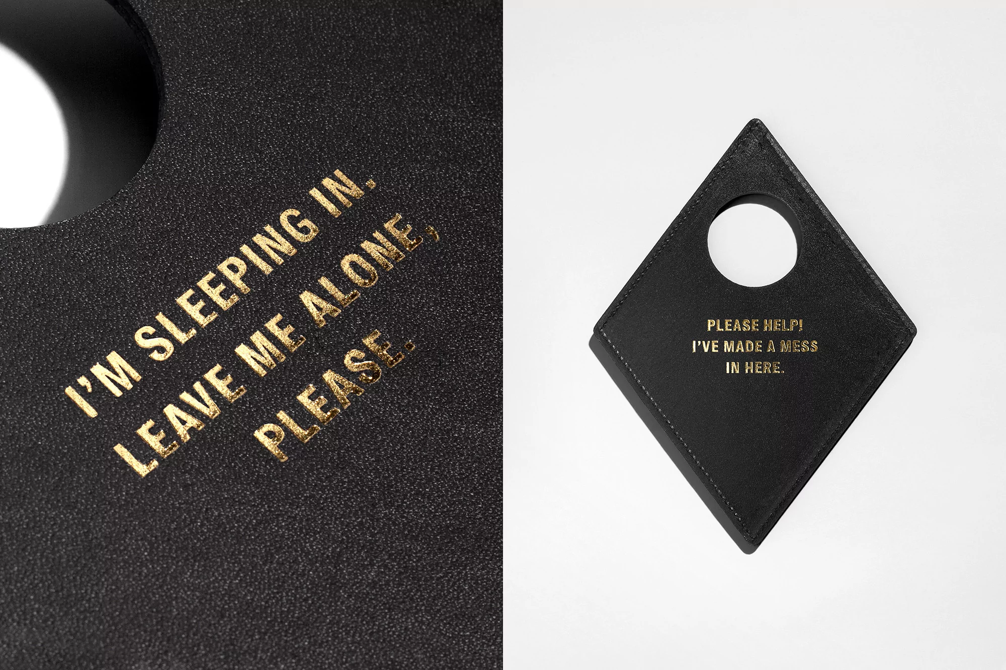 Close-up of two black leather door hangers with gold text. One reads 'I'm sleeping in, leave me alone, please', the other 'Please help! I've made a mess in here'.