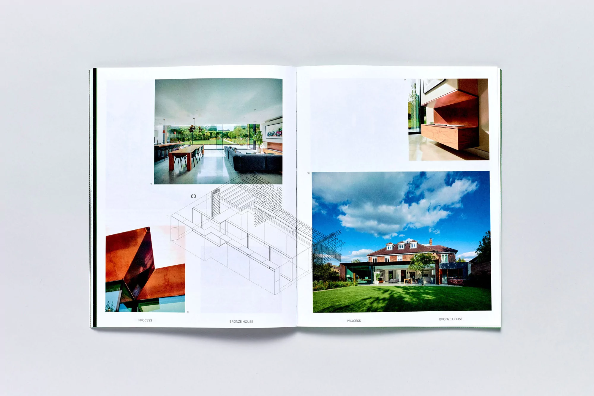 Open book spread featuring architectural photographs, blueprints, and renderings, showcasing interior and exterior designs of a modern house.