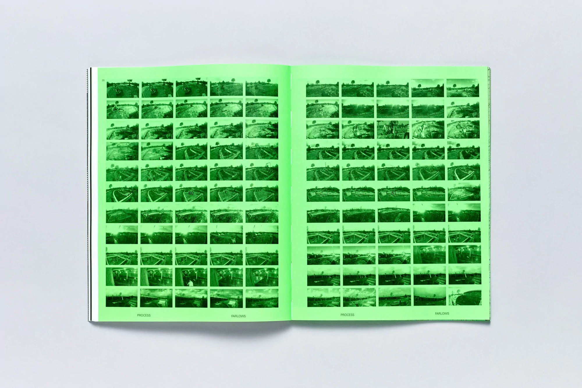 Open book with a neon green filter displaying a grid of photographic images featuring landscapes with fields and trees in daytime.