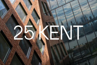Architectural exterior featuring red brick and reflective glass facade with city skyline reflection and bold white typography reading 25 KENT