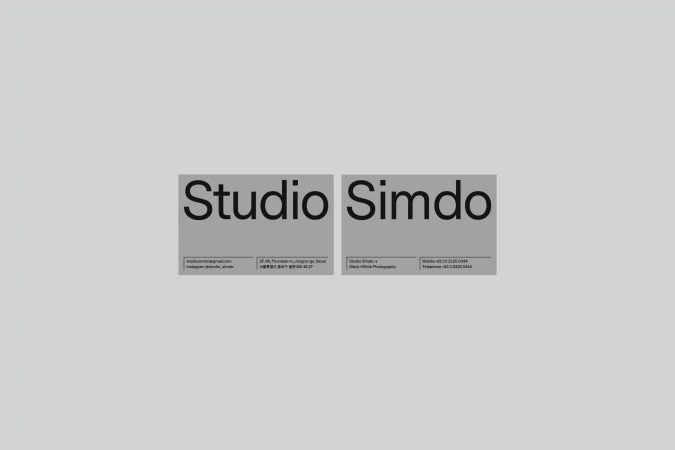 Two business cards for Studio Simdo, a black and white photography studio in Seoul, Korea, with studio contact details.