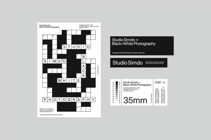Graphic design layout featuring Studio Simdo's black and white photography services, presented in a crossword puzzle format on grey background.