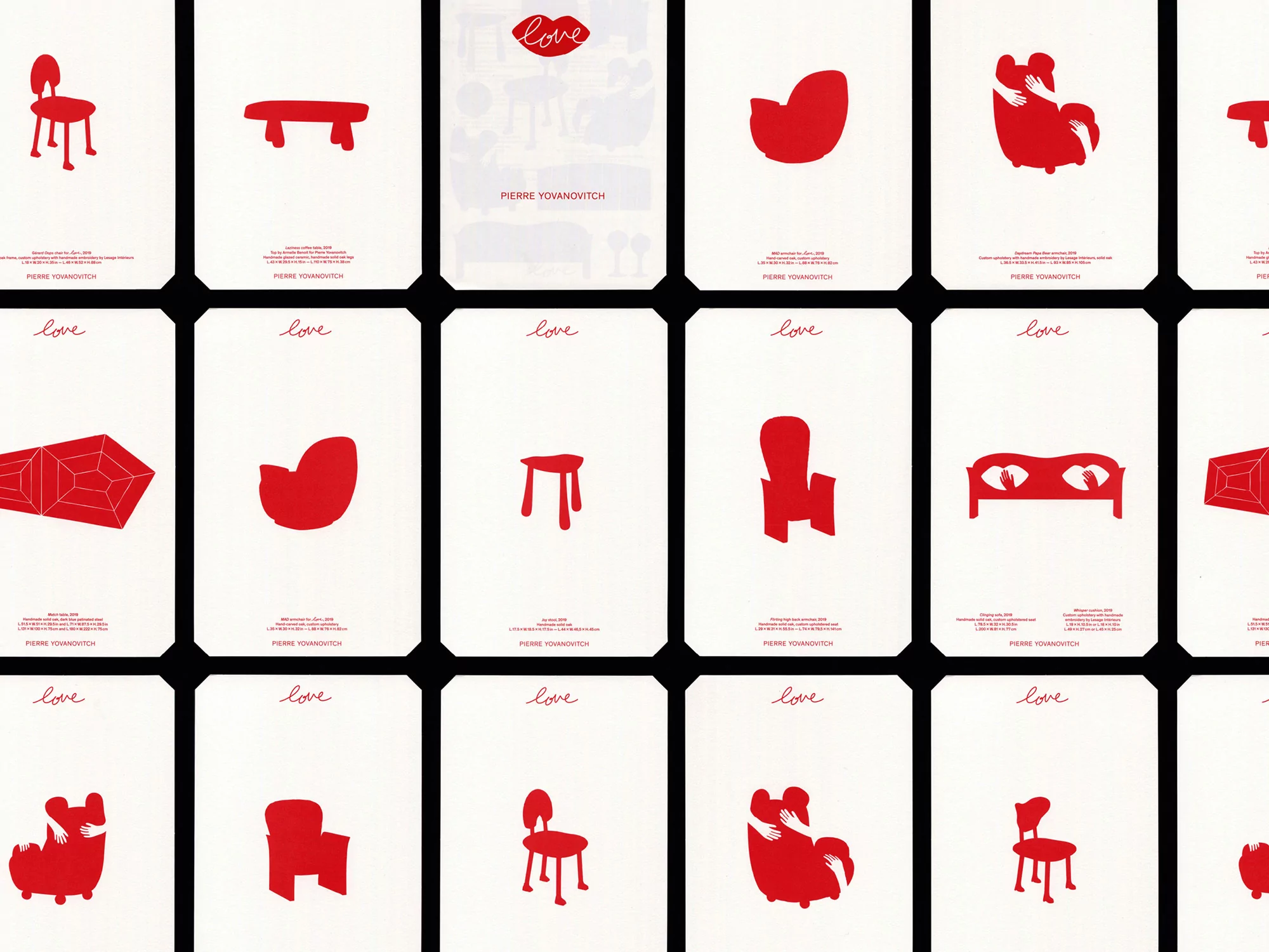 Cards with red furniture illustrations and the word 'love' on a white background, set against a black surface.