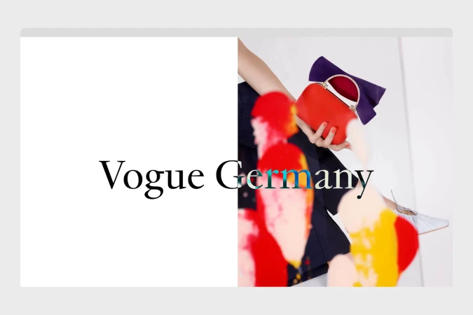 Hand holding a bright red clutch handbag with a metal handle, featuring abstract brushstrokes overlay and typography reading Vogue Germany.