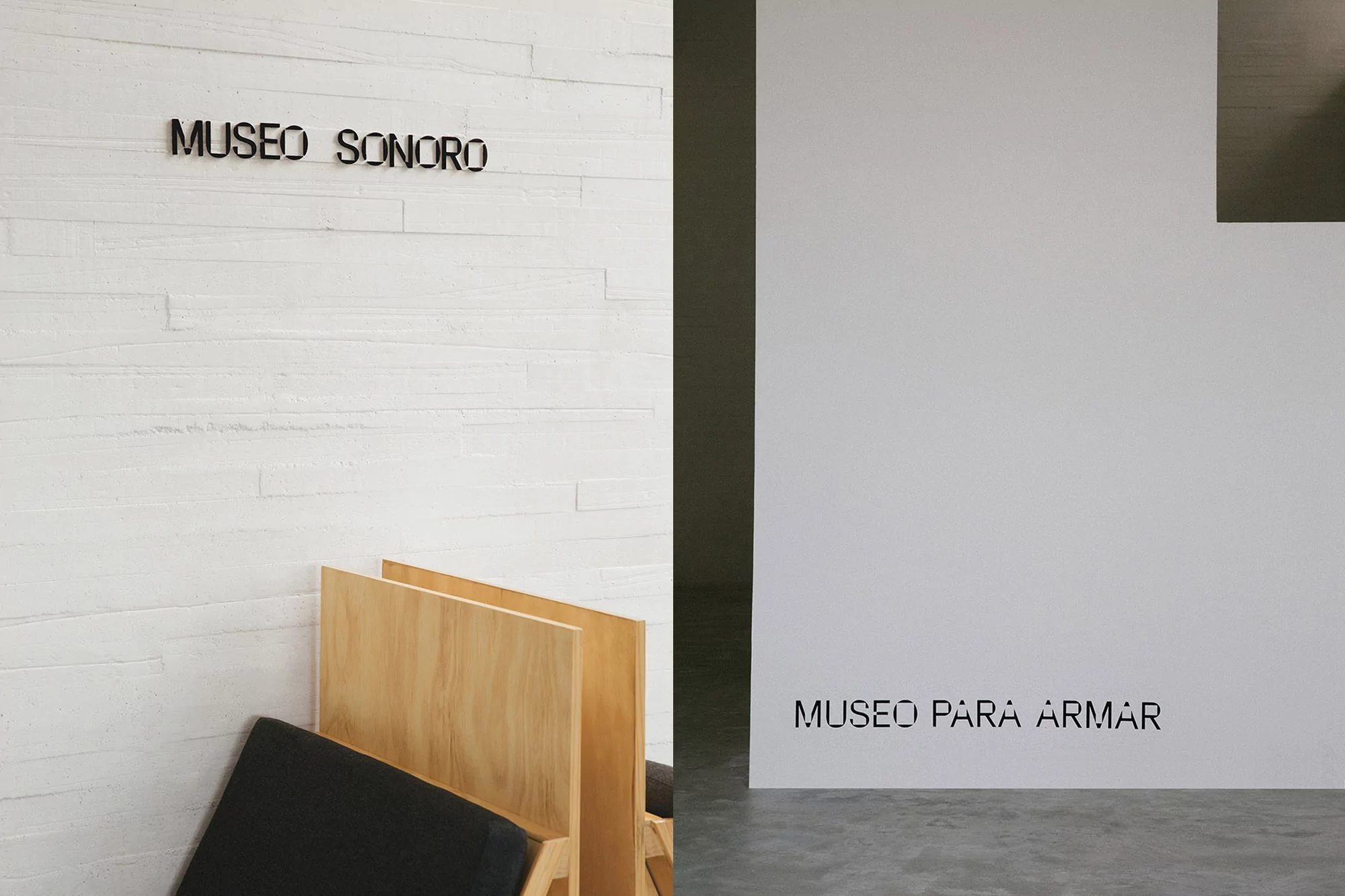 Minimalist interior featuring two chairs near the 'Museo Sonoro' sign and 'Museo Para Armar' sign against white walls and a concrete floor.