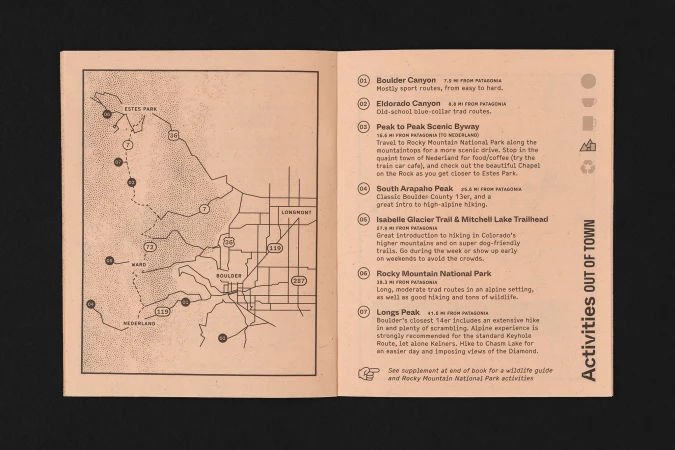 Guidebook spread open featuring maps and descriptions of outdoor activities near Boulder, Colorado, including hiking trails and scenic routes.