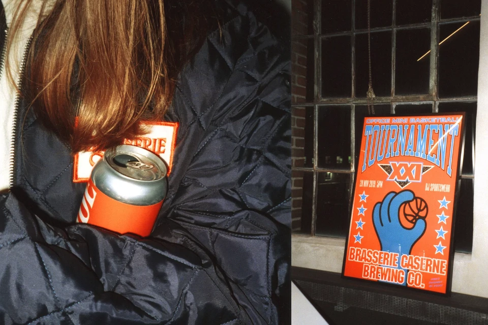 Person's hair alongside a can of soda on a quilted jacket and a poster in a window advertising a basketball tournament.