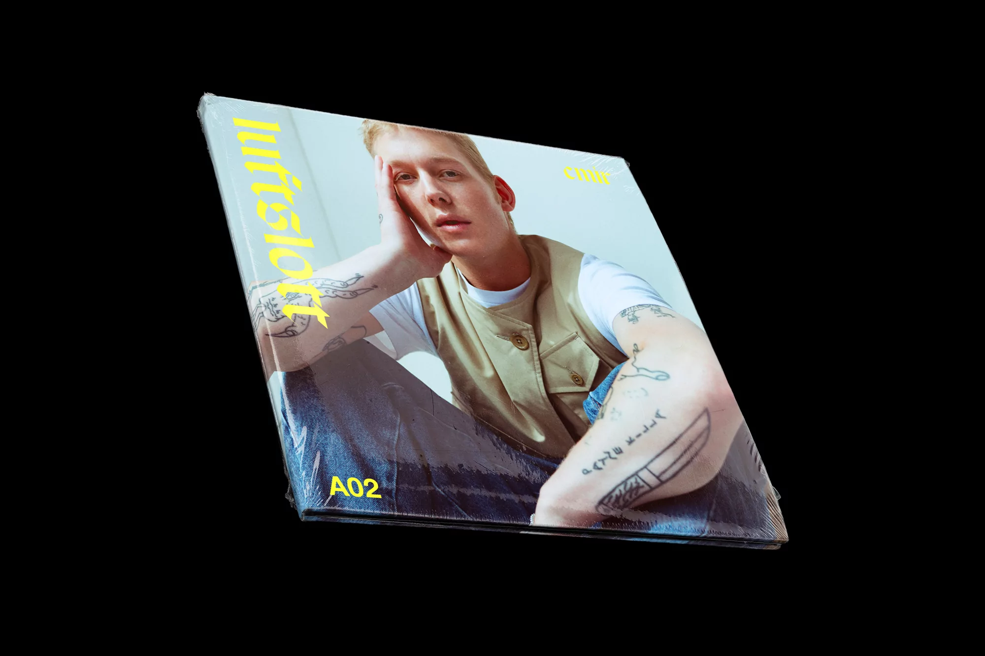 Album cover featuring a young adult with light skin, seated and resting his head on his hand, against a plain off-white background.