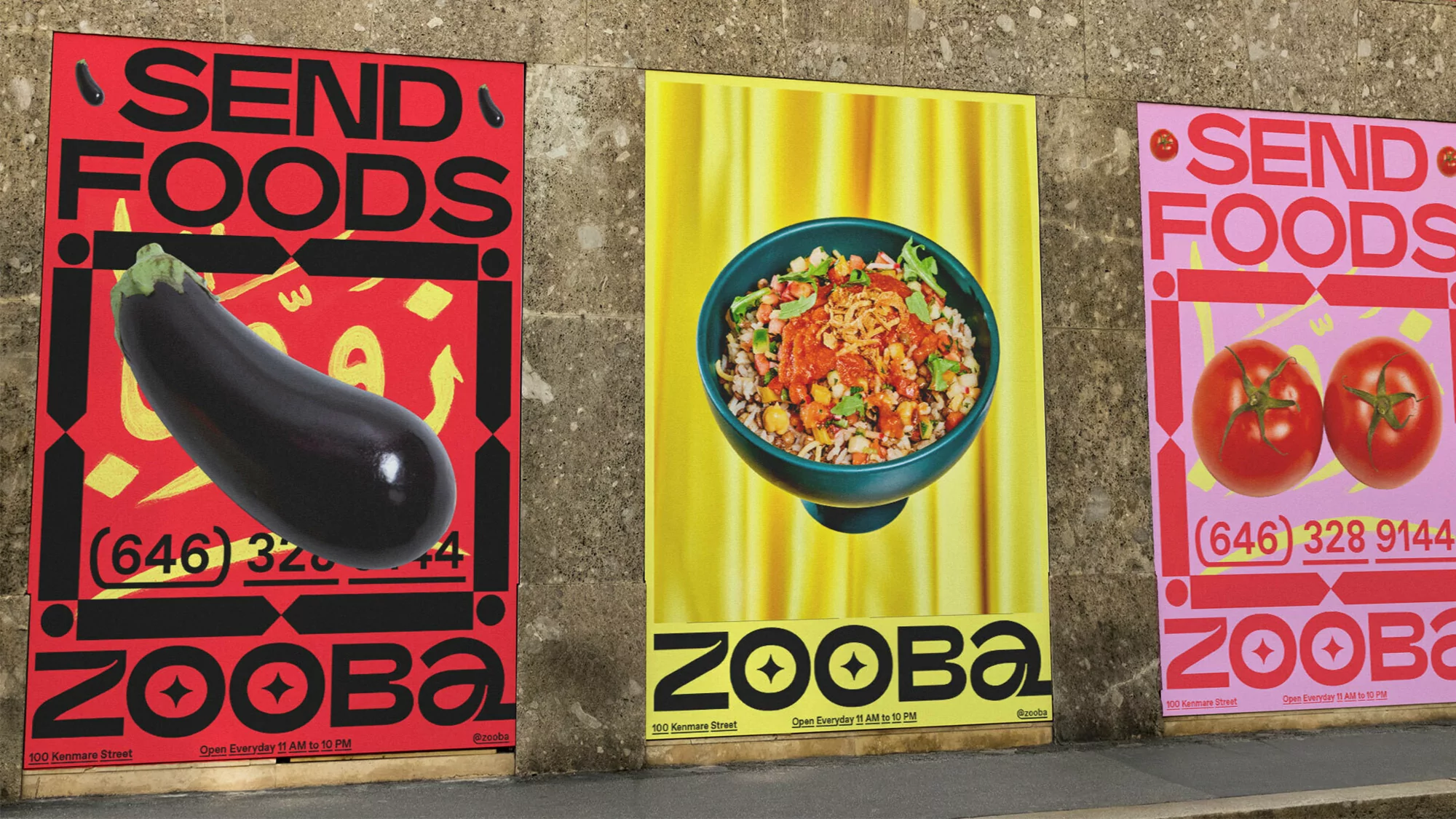 Three vibrant food posters on a wall showcase an eggplant, a rice bowl, and two tomatoes, all promoting Zooba restaurant.