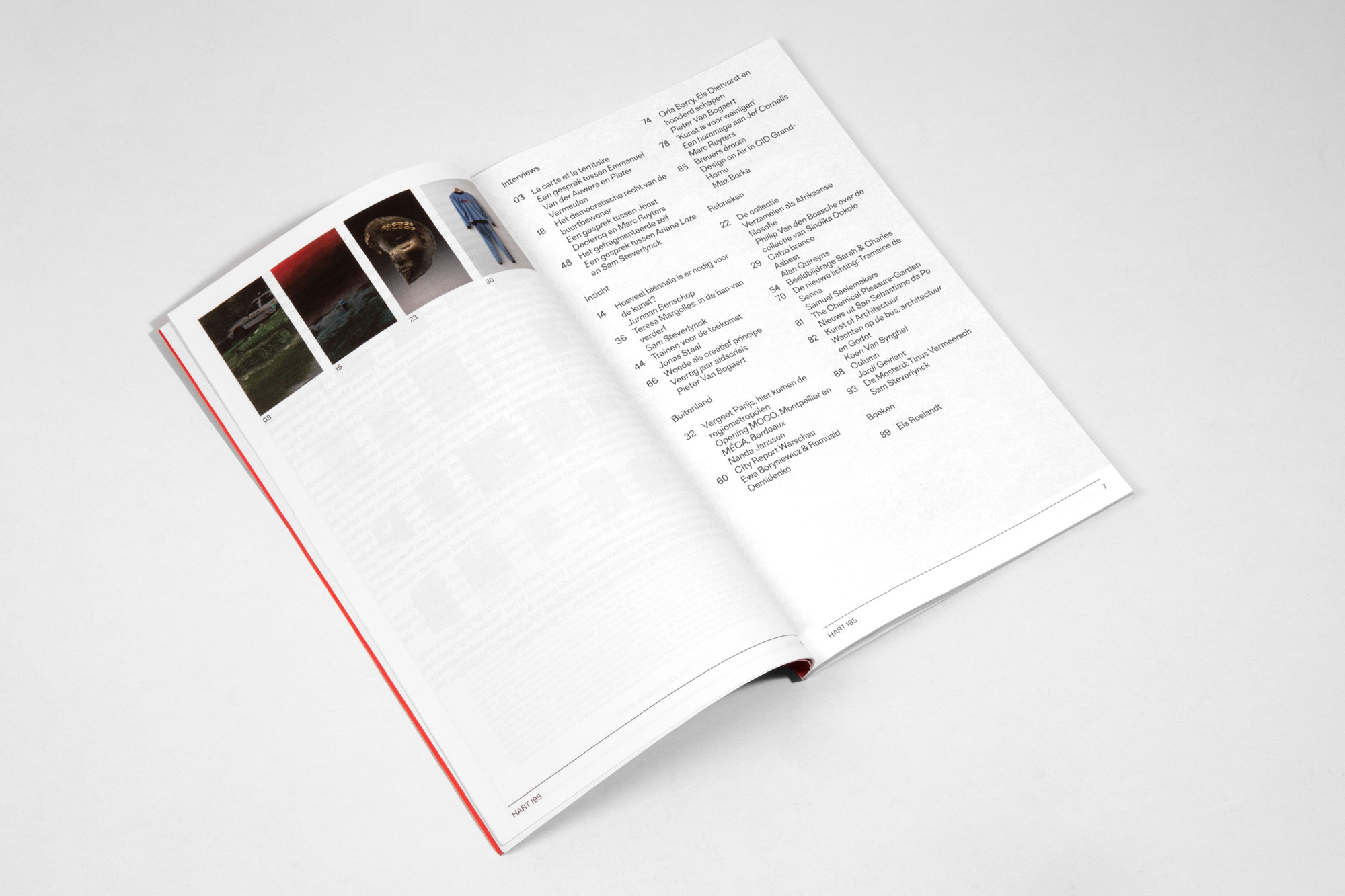 Open magazine spread showcasing diverse content on white surface, including featured images, text layout, and table of contents.