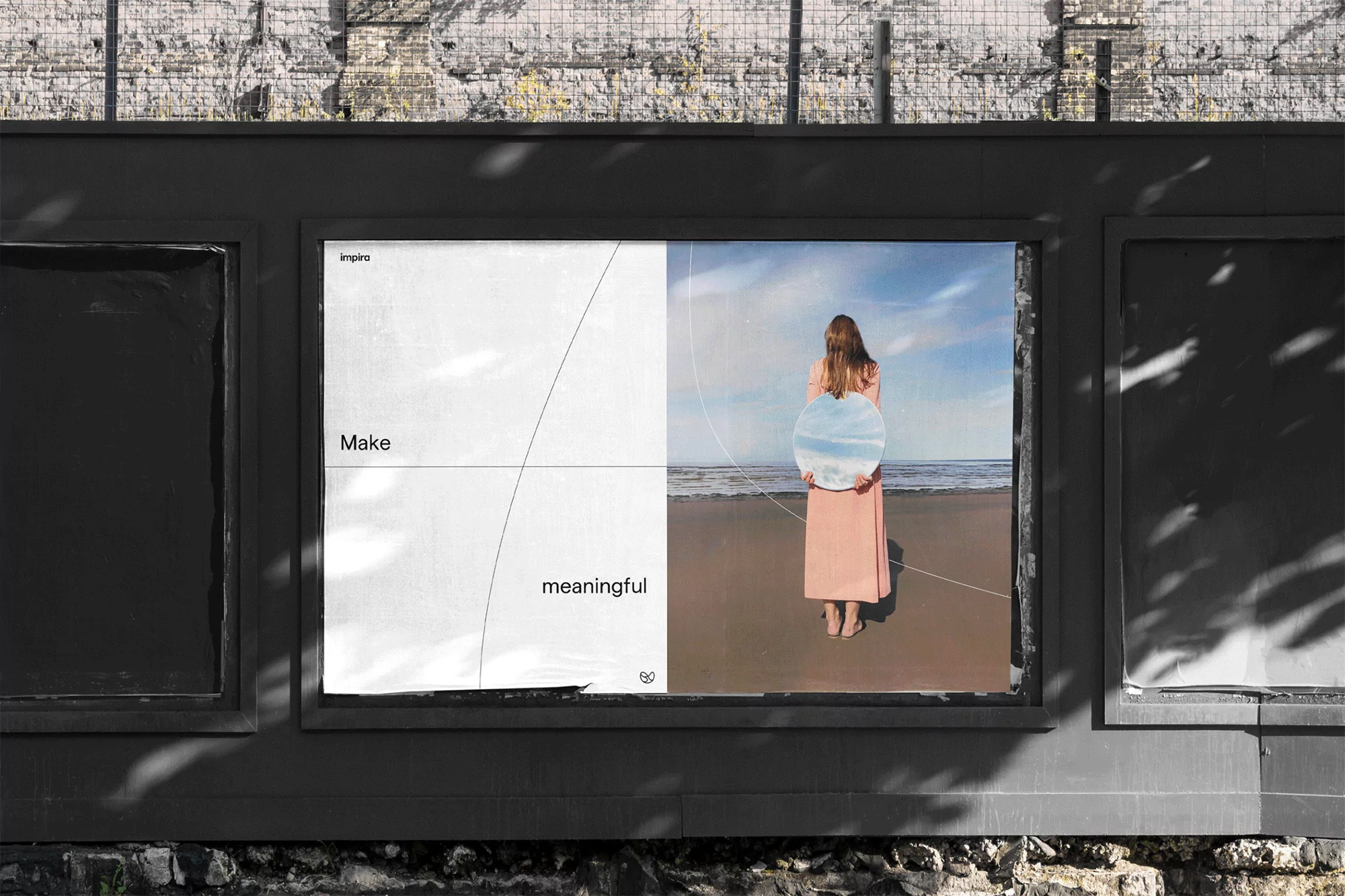 Billboard featuring a woman holding a mirror on a beach, next to a contrasting minimalistic graphic design in black and white.