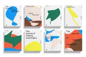 Eight magazine covers featuring clean graphic design with bold abstract coloured shapes and typography against a white background.