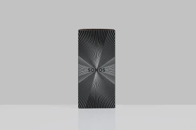 Sonos smart speaker box featuring black and white radiating graphic pattern on a grey surface.