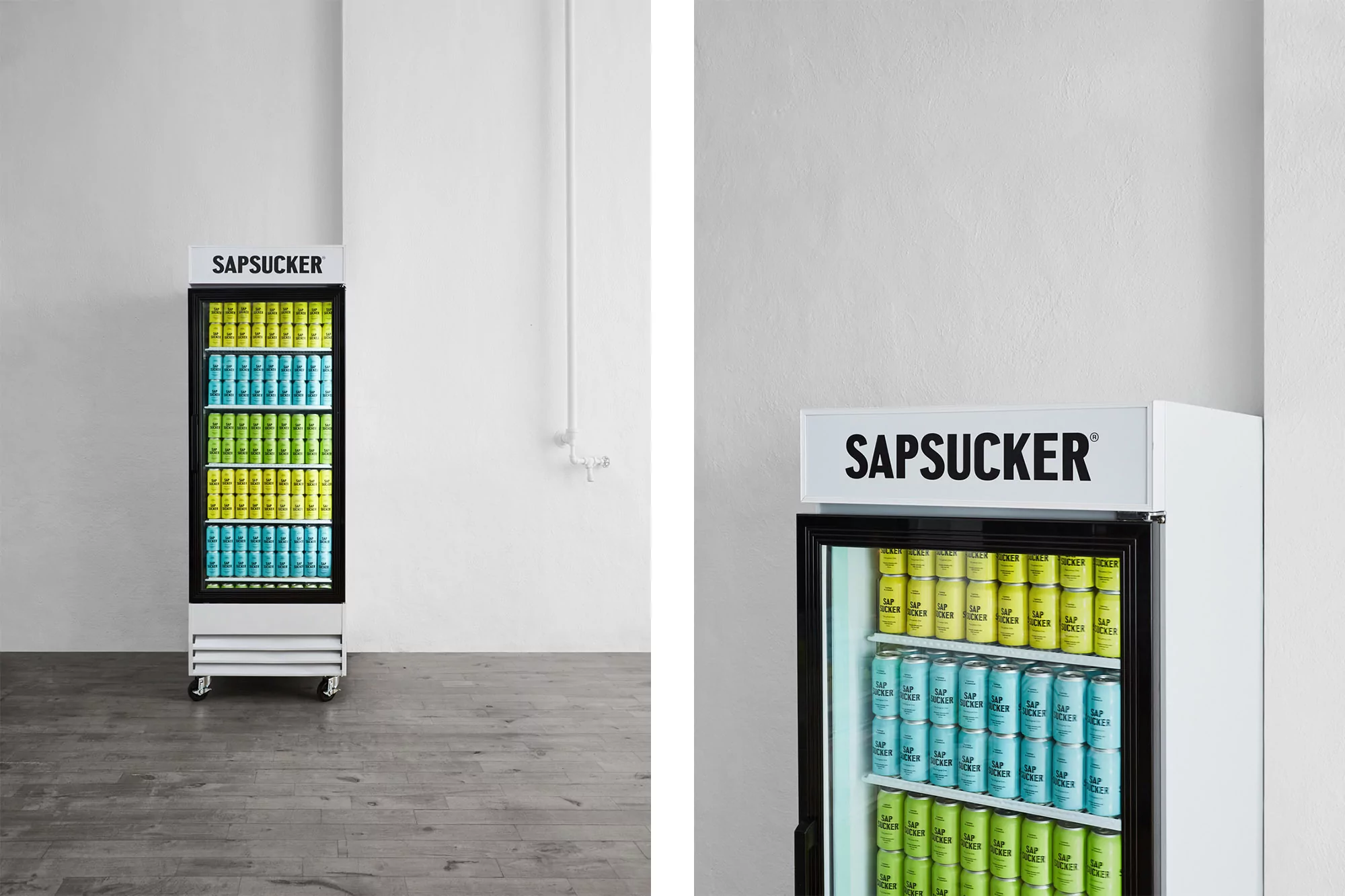 Two refrigerators stocked with blue, green, and yellow canned drinks against a white wall in an indoor setting, showcasing a clean aesthetic.