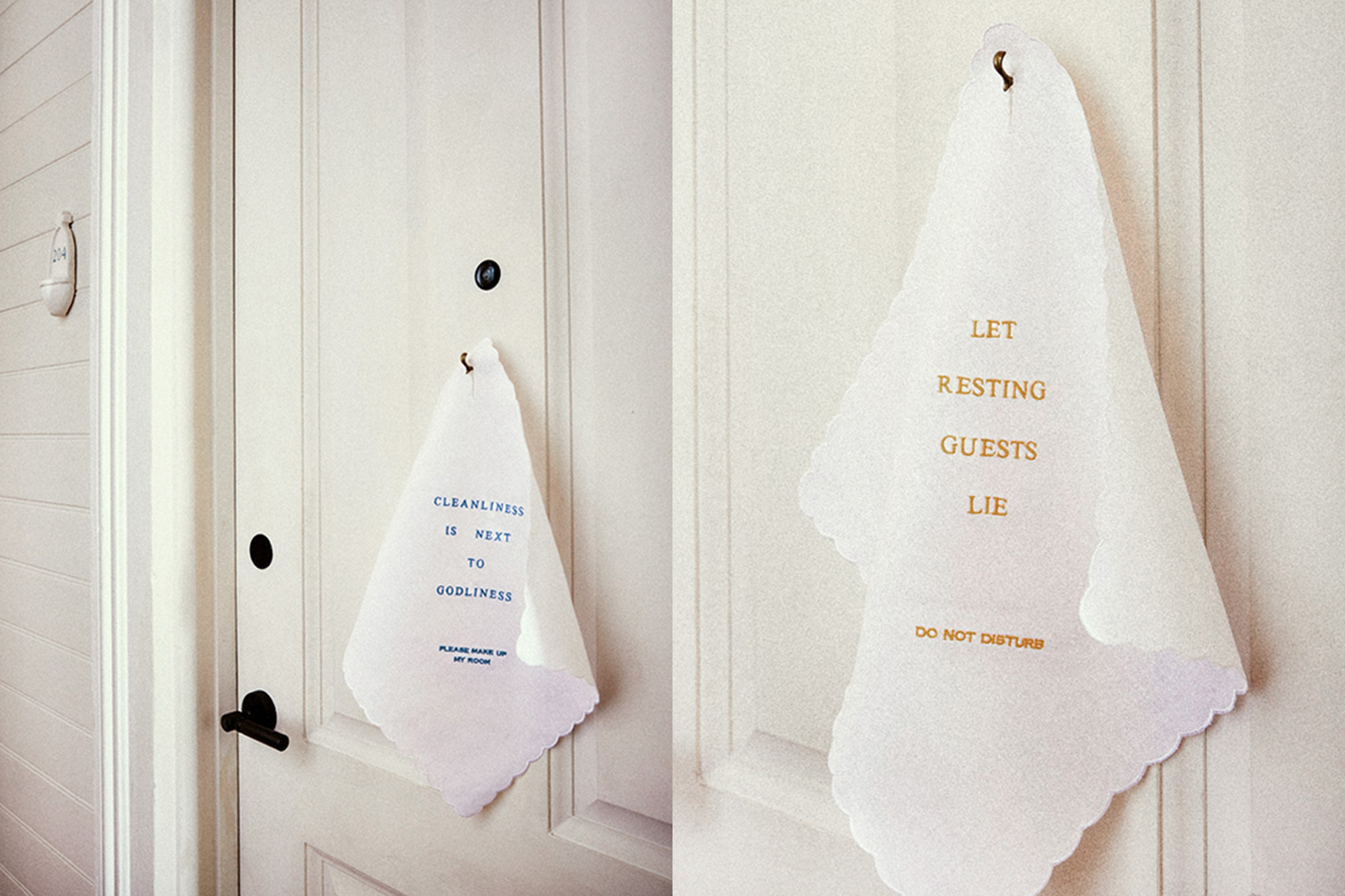 Two white 'Do Not Disturb' signs hang on closed white doors, one reading 'Cleanliness is Next to Godliness' in blue script.