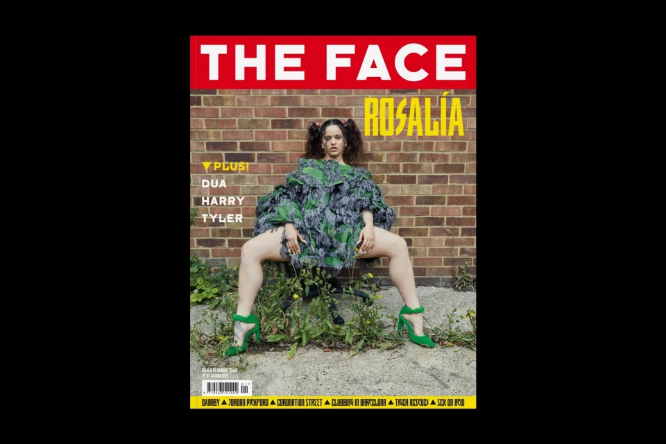 Magazine cover featuring a model in a green fringe outfit and high heels, posed in front of a brick wall with The Face logo.
