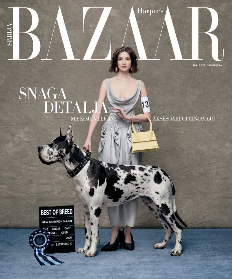 Harper's Bazaar cover featuring an adult female fashion model in a dress with a Great Dane dog and dog show award ribbon.