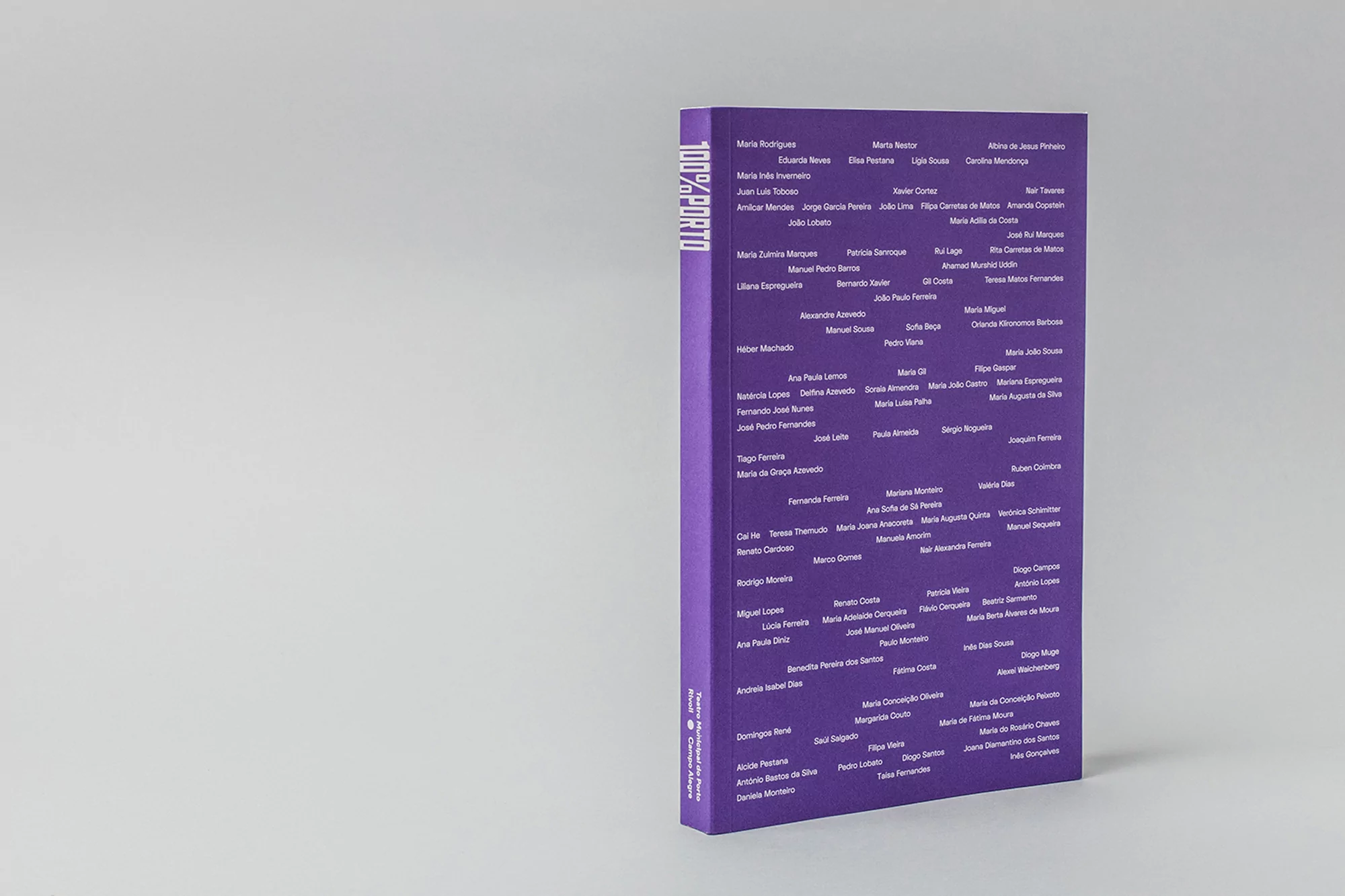 Purple book featuring various names printed on the cover against a plain white backdrop. Book cover design with purple color theme.