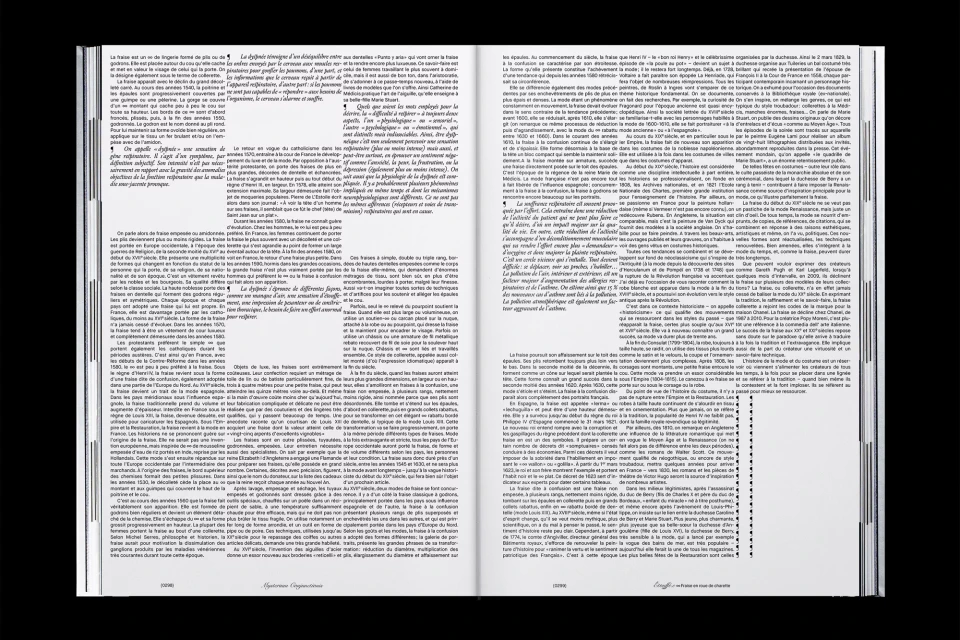 Open book displays text on both pages, illuminated against a dark background, showcasing book design and typography elements.