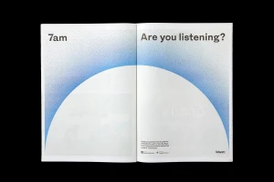 Open spread of a print publication showing minimal typographic layout with blue stippled gradient arc design and podcast branding.