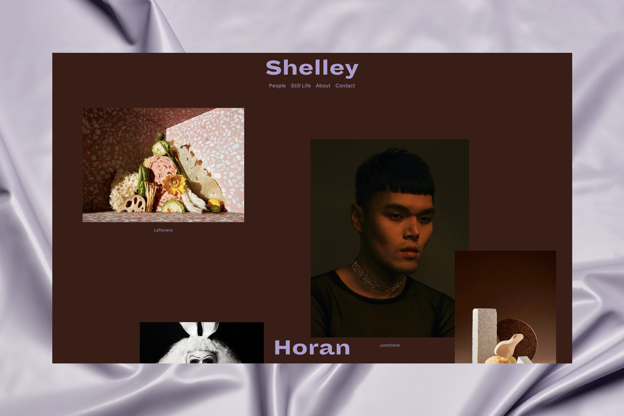 Website design showcasing a portrait of a person and a still life image of assorted food, set against a textured backdrop.