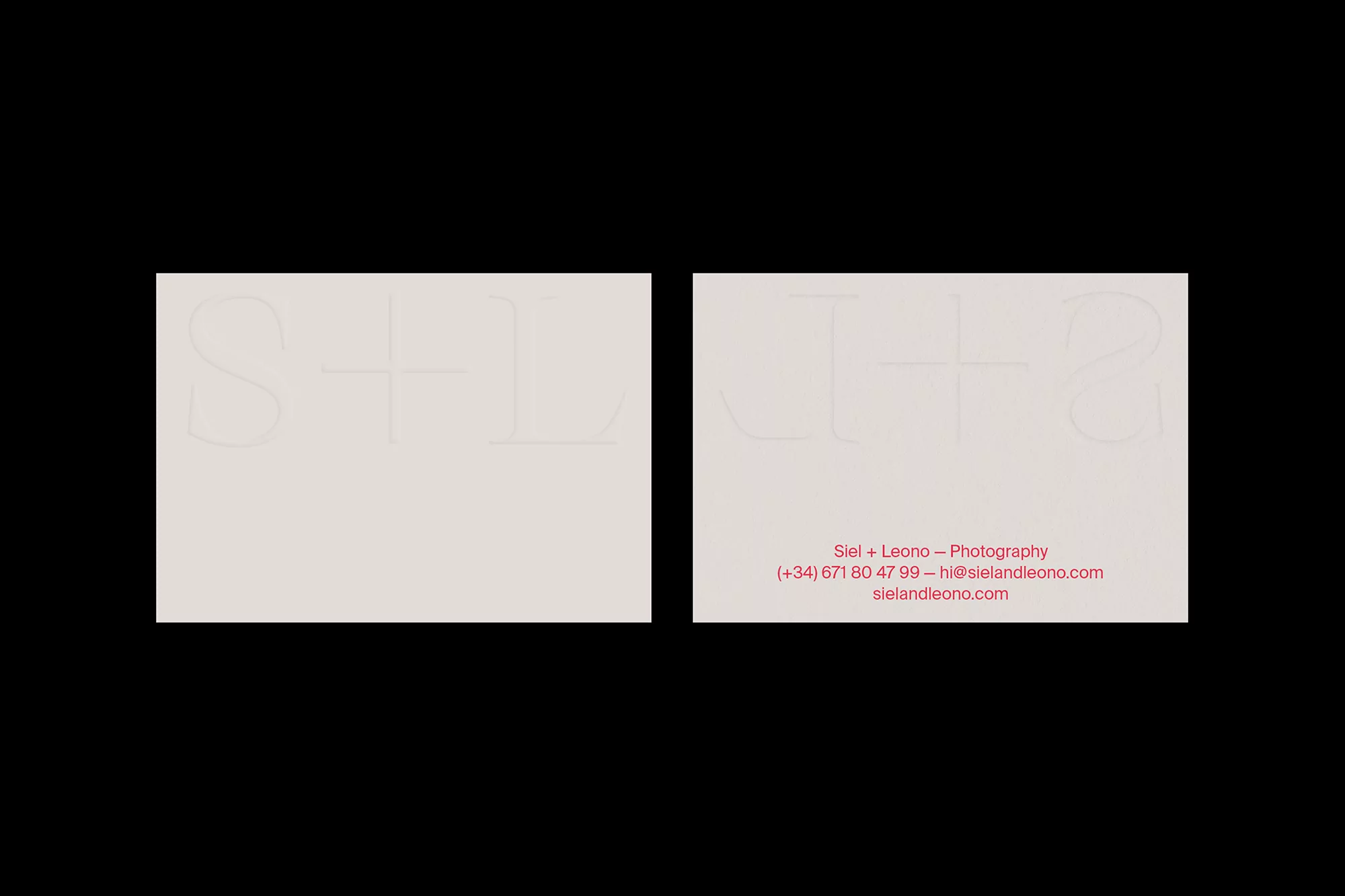 Two business cards with the name Siel + Leono Photography and contact information, set against a black backdrop.
