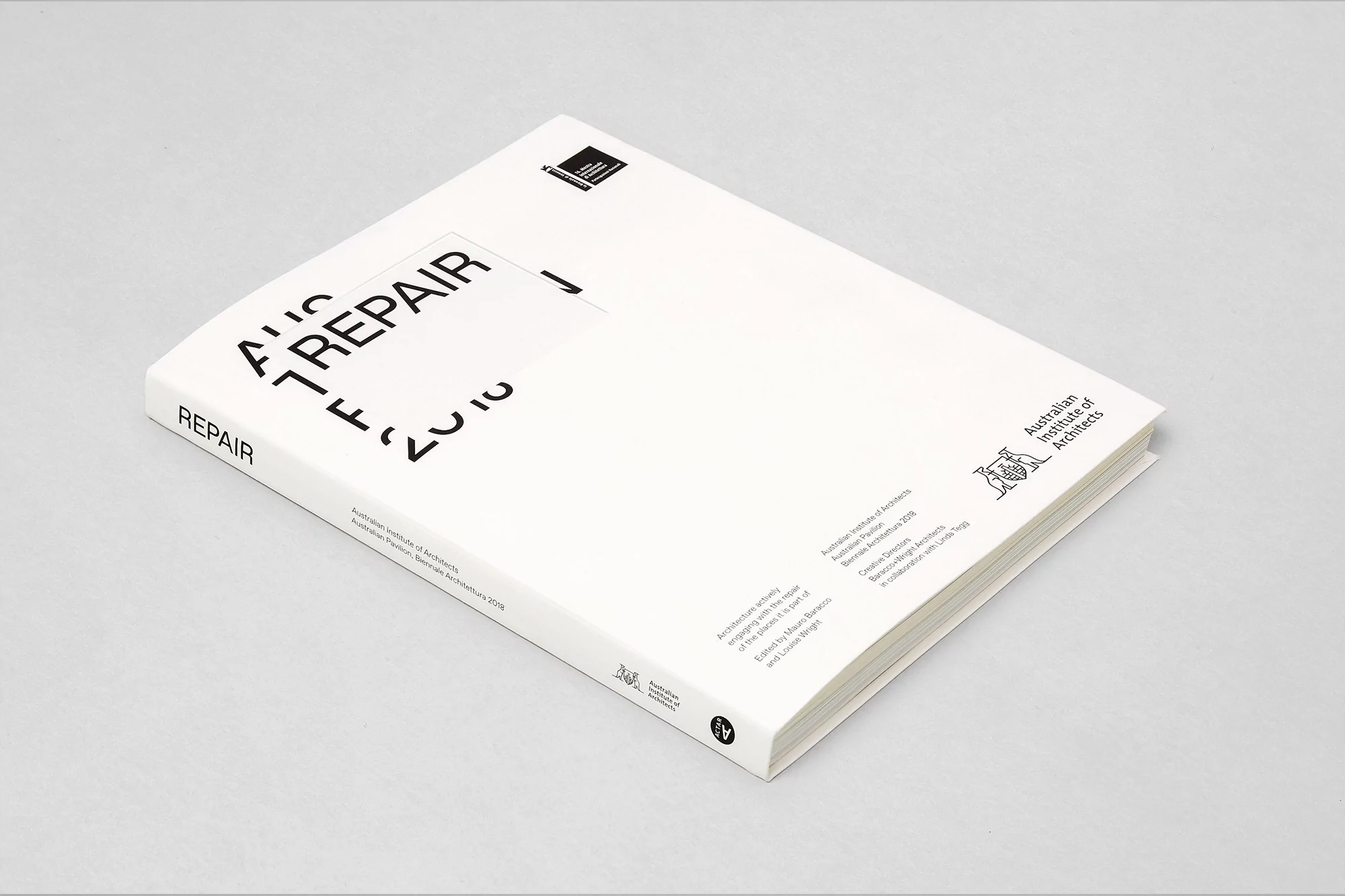 Book cover with bold title 'Repair' on a light surface, featuring architectural design content by the Australian Institute of Architects.