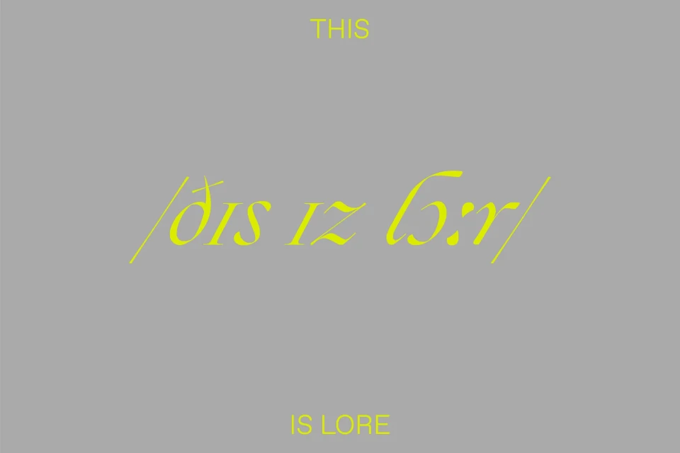 Text art on a gray background featuring the phrases 'THIS,' '/ðIS IZ LOr/', and 'IS LORE' in stylized yellow font. Abstract design.