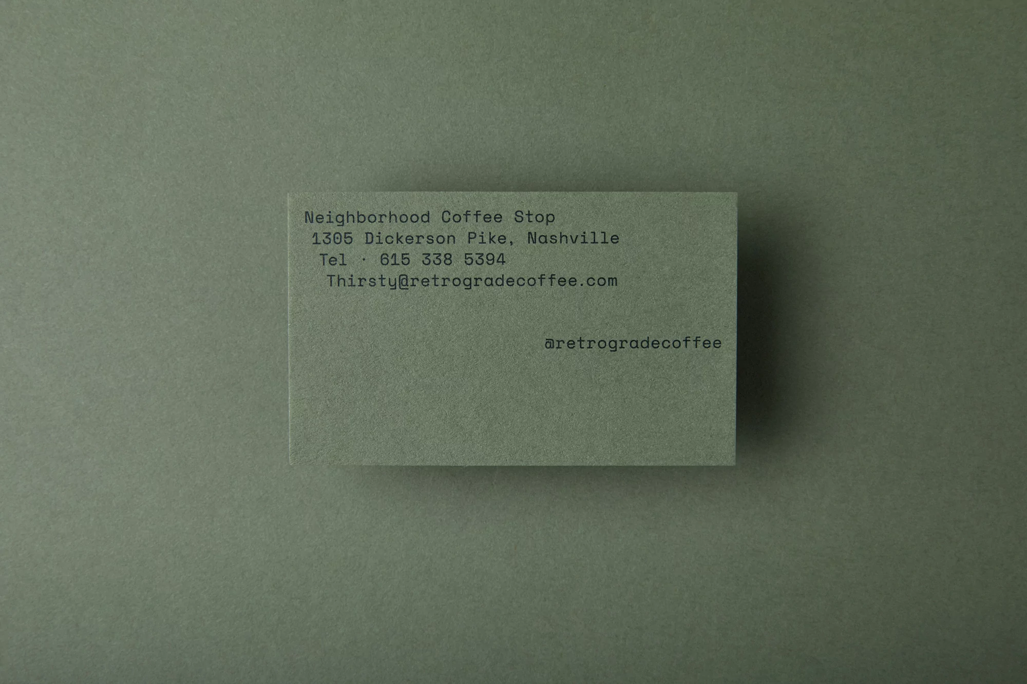 Business card for Neighborhood Coffee Stop, 1305 Dickerson Pike, Nashville. Contact details and social media handle included.