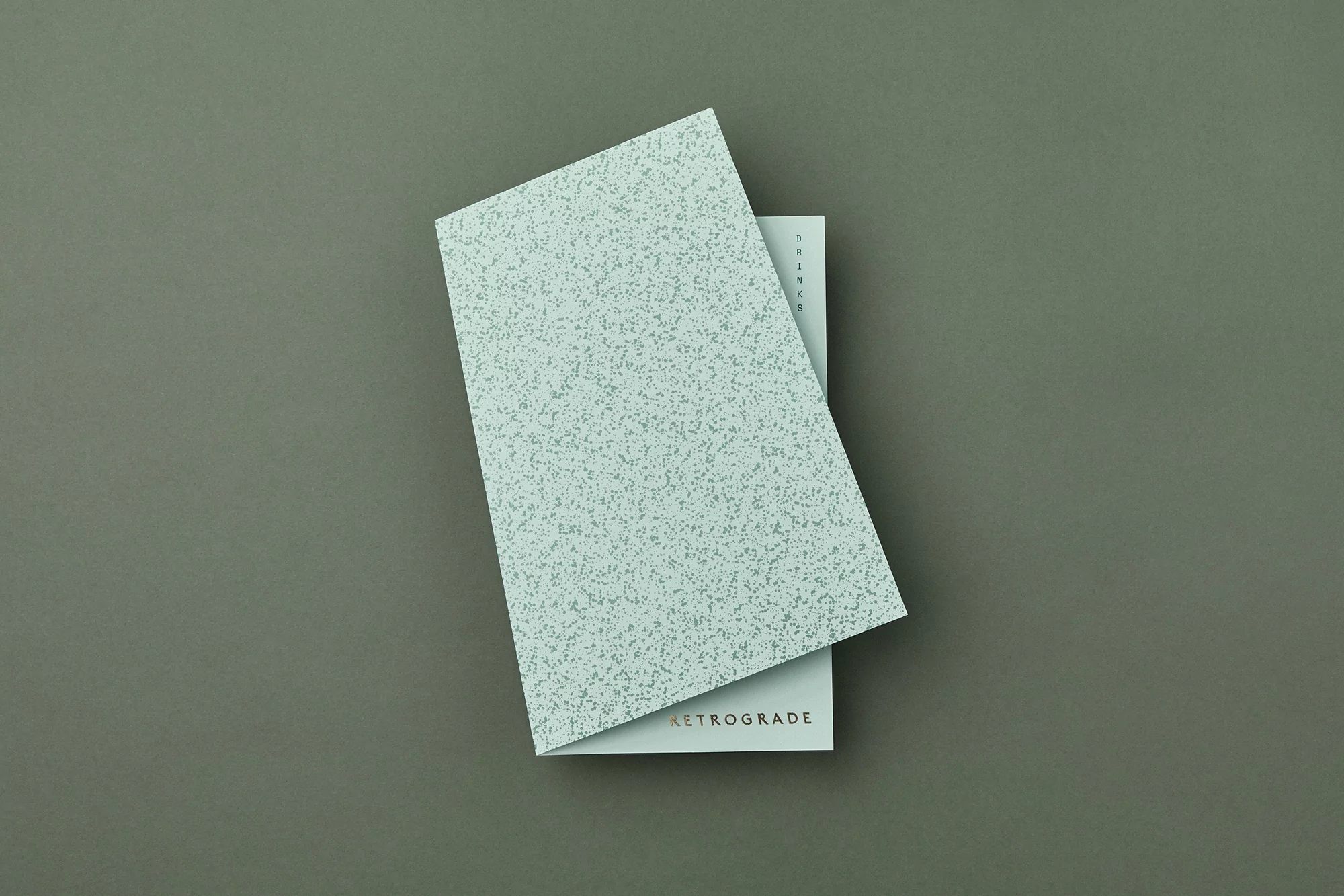 Pale blue speckled rectangular cards on matching backdrop. The design features a minimalist, modern aesthetic with simple typography.