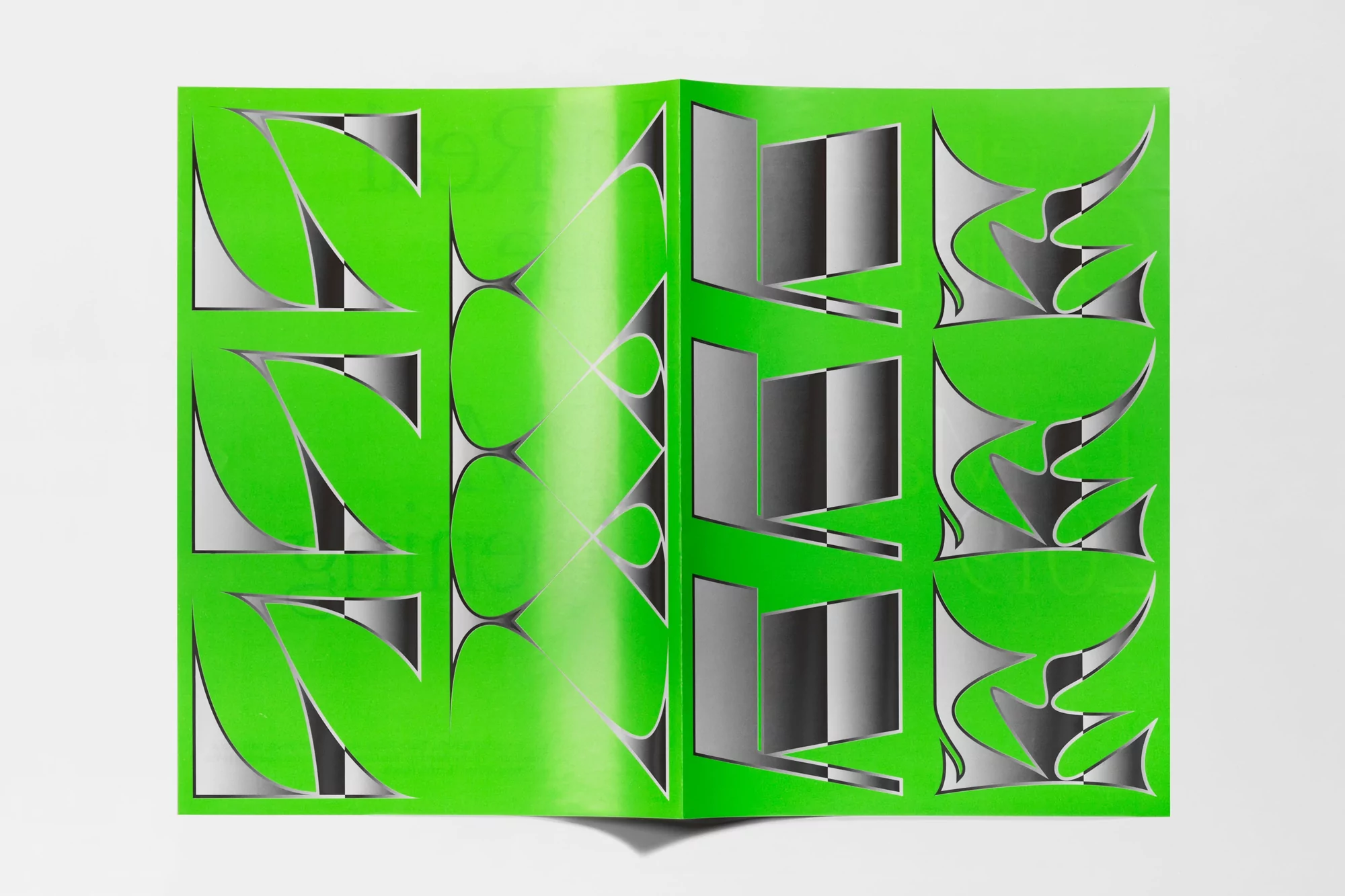 Graphic design on magazine spread: vibrant green background with abstract leaf shapes and gradient geometric patterns, studio lighting.