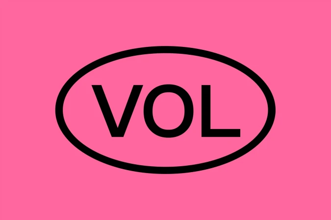 Graphic illustration with bold black VOL letters inside an oval shape, set against a bright pink background for a striking visual.