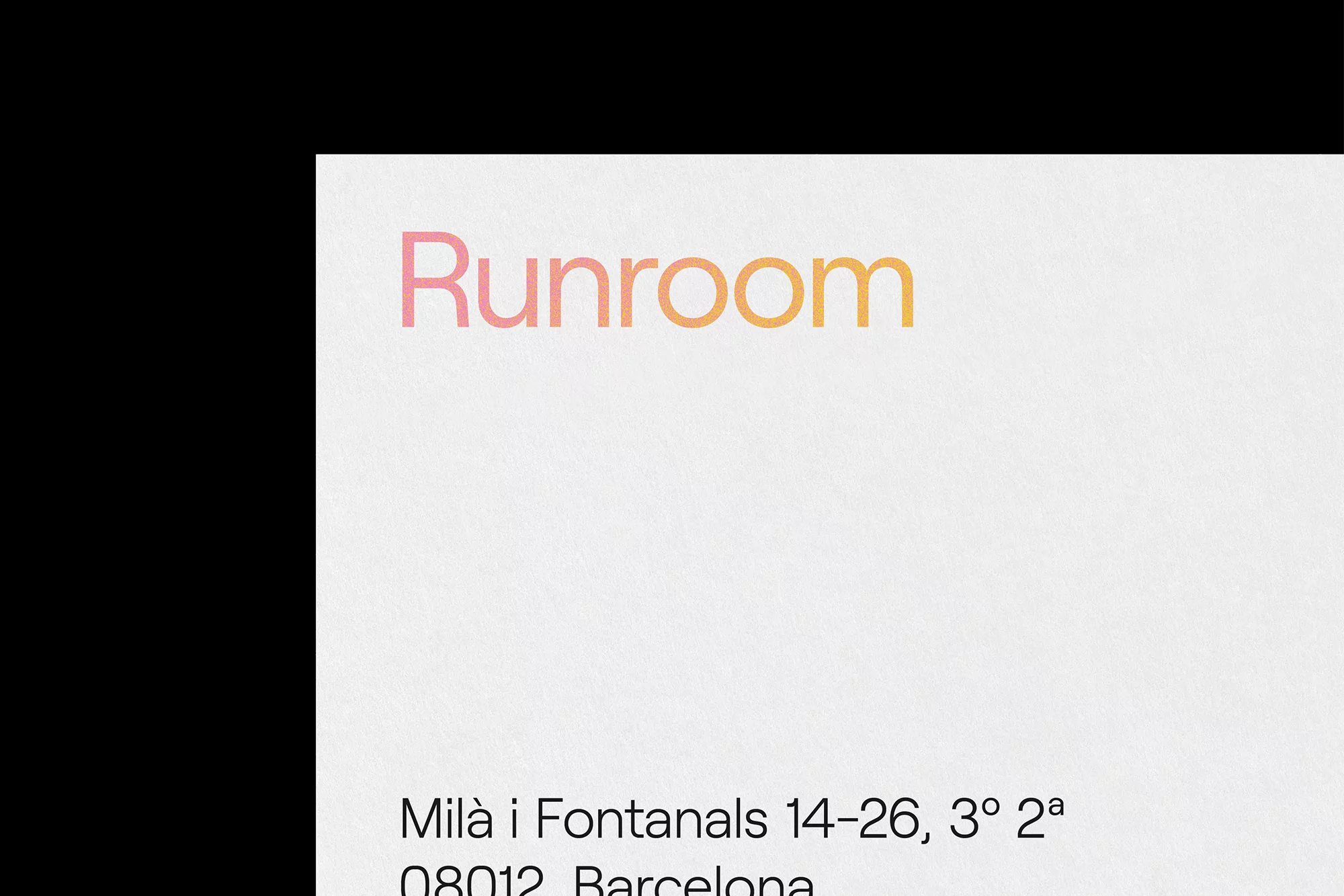 Close-up studio shot of a Runroom advertisement against a white background with black negative space on the left.