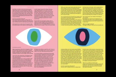 Editorial double-page magazine spread featuring bold eye graphics and extensive columns of interview text on pink and yellow background