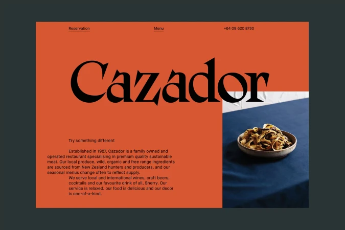 Website landing page for Cazador restaurant, featuring the restaurant's name in large text with a dish of pasta, New Zealand.