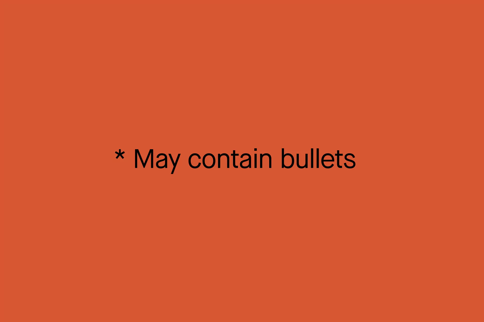 Simple graphic design against an orange background with the warning text 'May contain bullets' in the center of the composition.