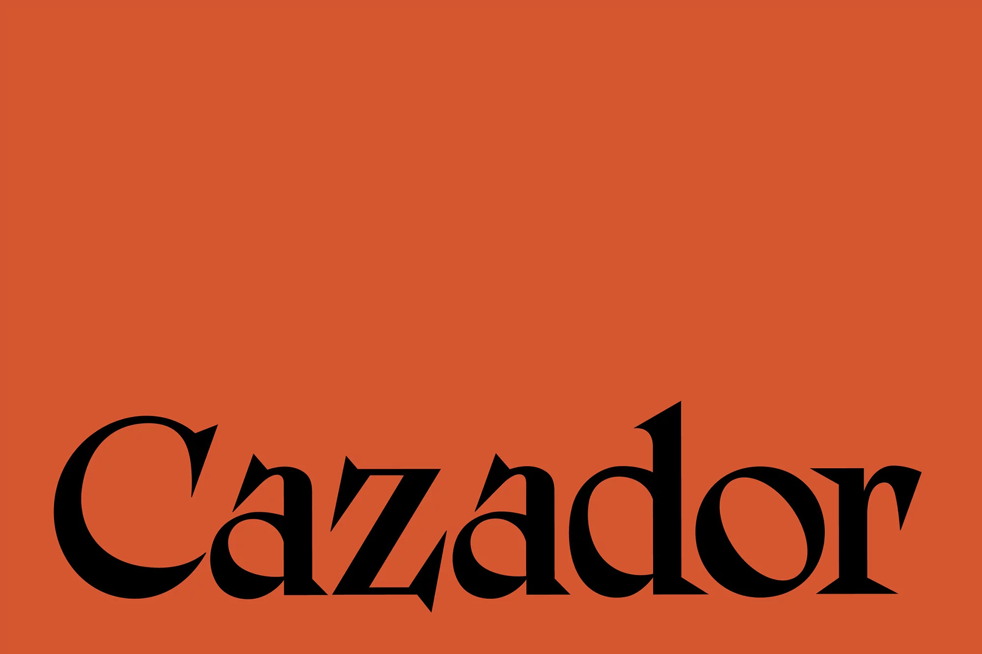 Promotional image with the word "Cazador" in black, displayed against a vibrant orange background, utilizing elegant typography.