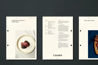 Three recipe cards featuring chargrilled venison and sour cherry duck on cream paper against a dark grey background.
