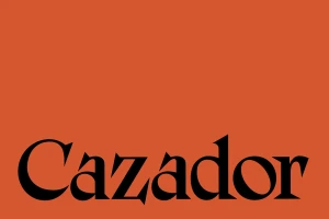 Cazador brand identity typography featuring black serif lettering against an orange background