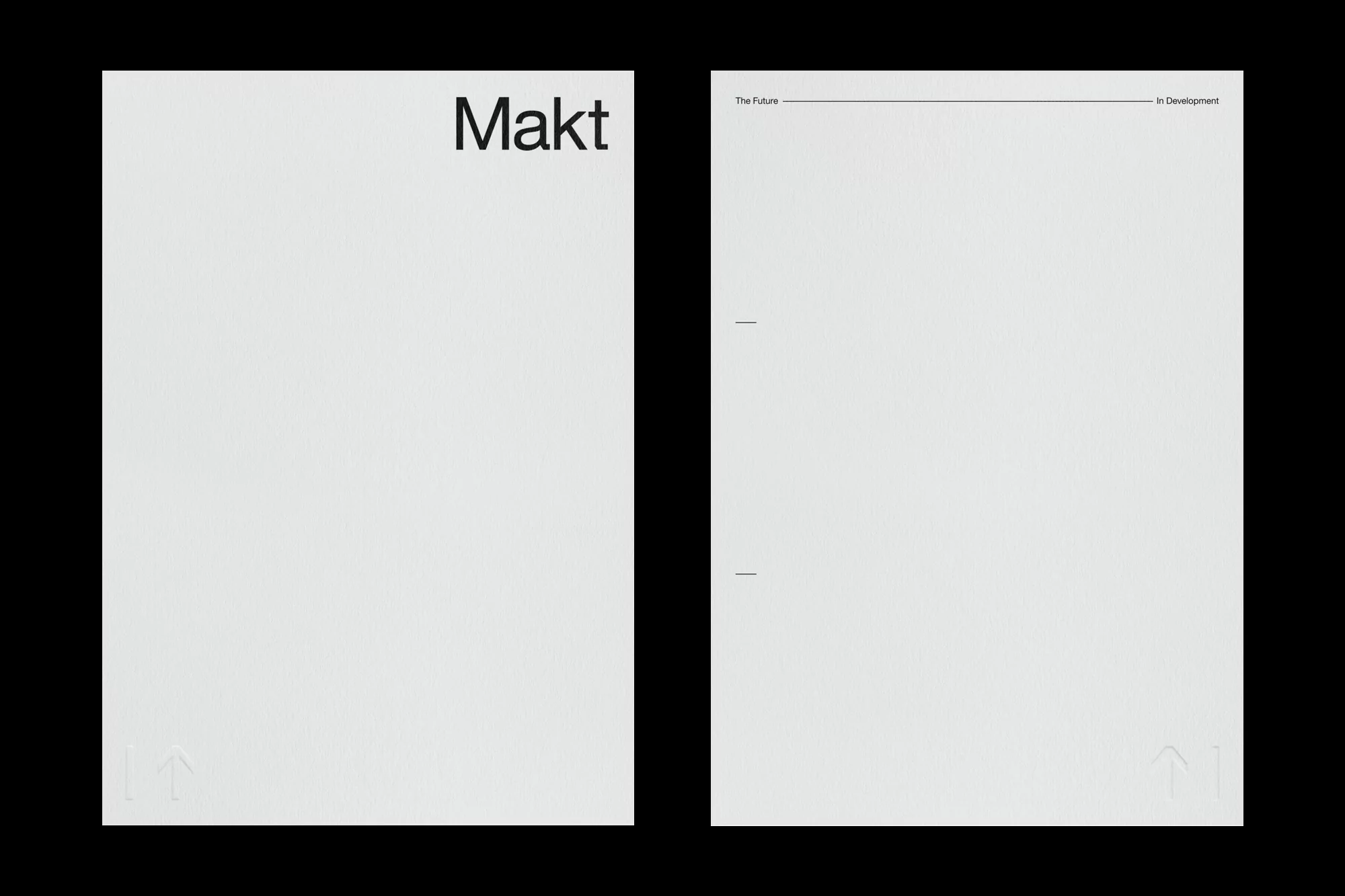 Minimalist design with two white sheets featuring the word 'Makt' and text 'The Future, In Development' on a black background.