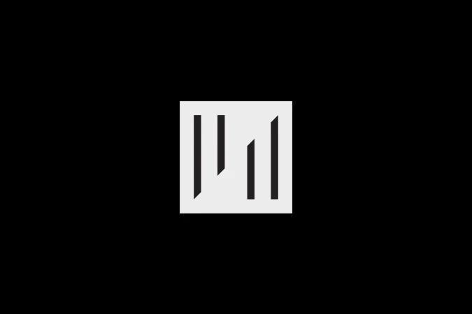 Abstract illustration of white square shape with vertical black lines on a solid black background. Graphic design and minimalism.