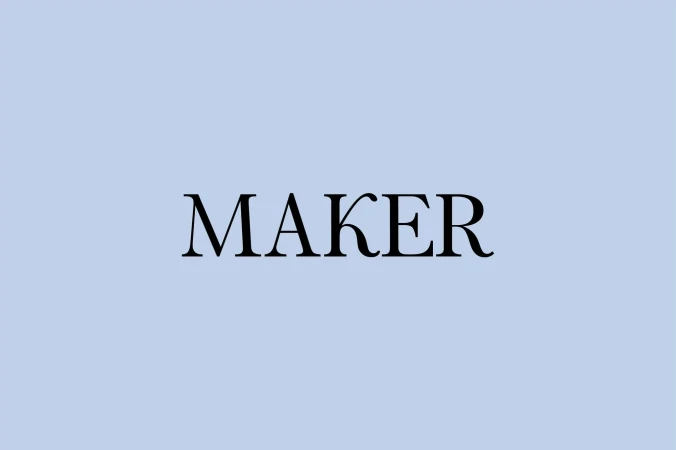 Black 'MAKER' text against a pale blue background, high contrast, simplicity, design element, typographic, studio lighting, and centered.