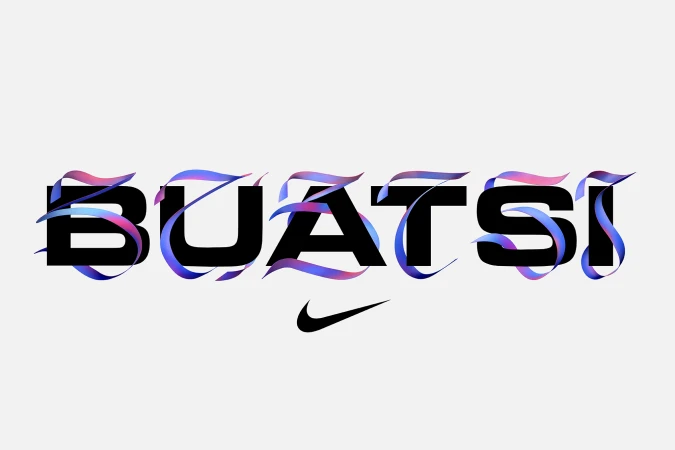 Graphic design features the word BUATSI in bold black letters with ribbon-like accents in blue and pink, and a black Nike swoosh logo.
