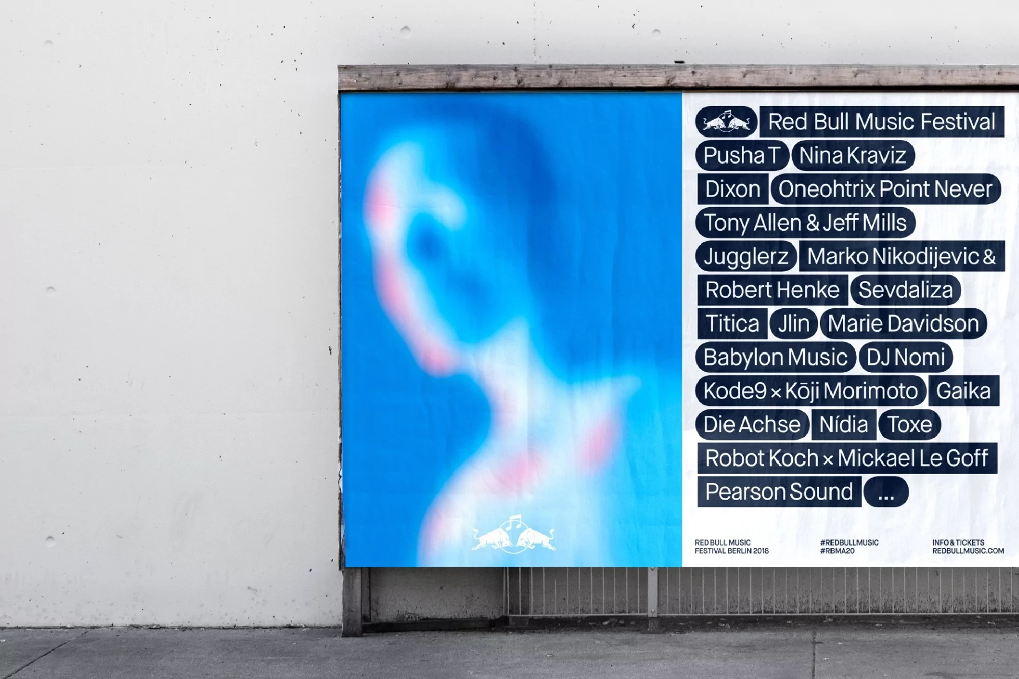Outdoor billboard featuring a blurred person's silhouette and list of names for the Red Bull Music Festival in Berlin, Germany.