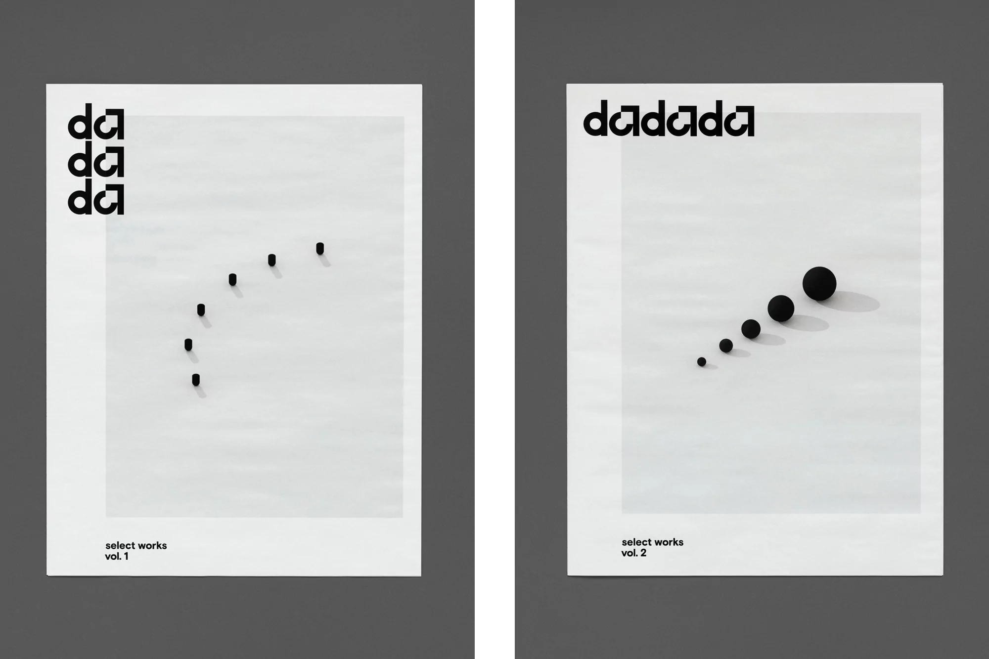 Two Dada-themed posters: one features a minimalist composition with black dots, the other uses black spheres to create a visual rhythm.