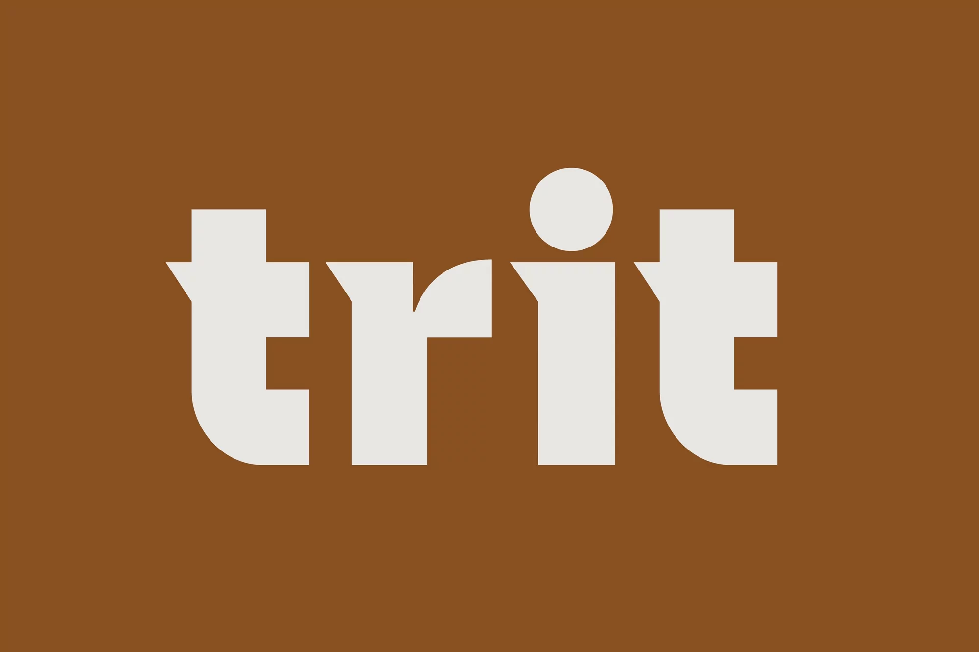 Bold typographic logo featuring the word 'trit' in a custom sans-serif font, rendered in light beige against a dark tan background.