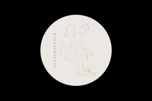 Minimalist line art illustration of a seated man and woman with vertical brand text inside a white circle on a black background.