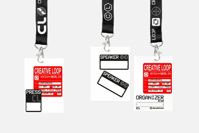 Three event passes hanging from lanyards on a white background display conference and speaker information with event branding.